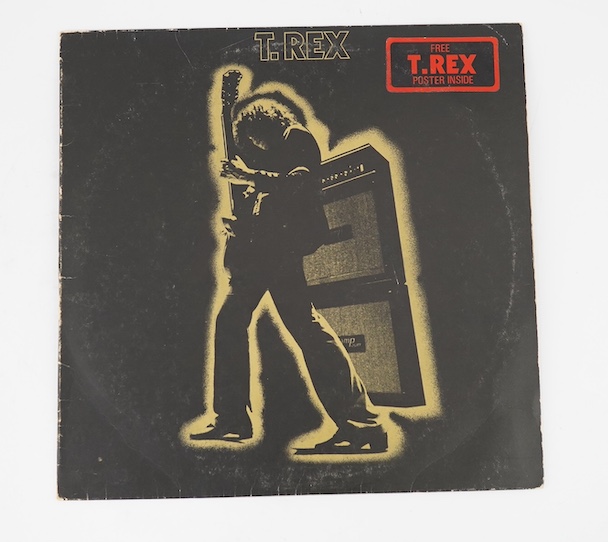 Four T. Rex LP record albums; Electric Warrior on Fly HIFLY6 with inner sleeve and stickered cover (missing poster), The Slider, Bolan Boogie, Ride a White Swan. Condition - fair